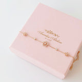 Secret Blossom Bracelet in silver / ROSE GOLD with crystal daisy flower charms