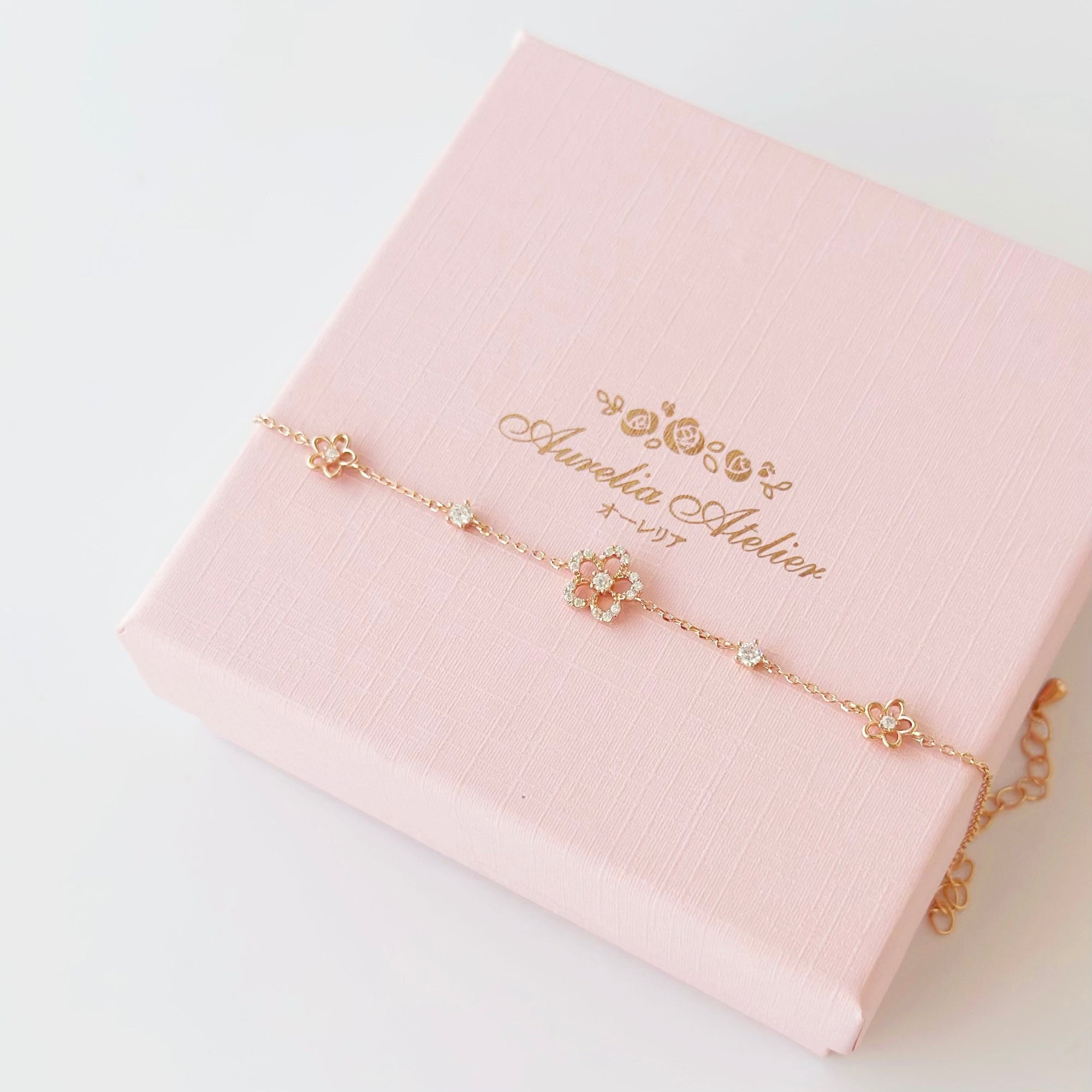 Secret Blossom Bracelet in silver / ROSE GOLD with crystal daisy flower charms