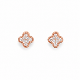 A pair of rose gold stud earrings with a four-petal clover or flower motif, each adorned with a pavé setting of clear round-cut stones, shown on a plain white background.